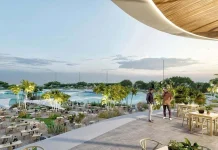 La playa de Alovera tiene un duro rival: una laguna con olas para surfear junto al estadio del Atlético de Madrid Junto al Metropolitano quieren que, surfeando, se acerquen medio millón de personas al año a esta nueva superficie de ocio.