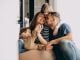 Young family with their sons at home having fun